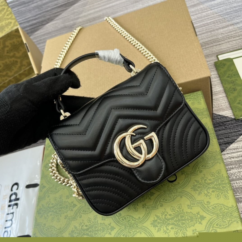 G*u*i top handle bags